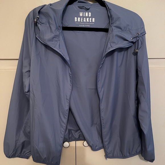 NWOT never worn Windbreaker size is 1X but more like sz 12
~ 22” pit to pit - Picture 2 of 5